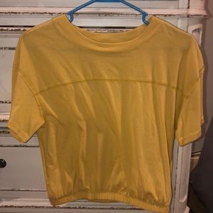 yellow elastic crop top. fits like a small